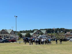 Law enforcement officials gather at Apalachee High School. Law enforcement officials gather at Apalachee High School.