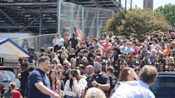 Students wait to be picked up by their parents after a shooting at Apalachee High School on Sept. 4, 2024, in Winder, Georgia. Multiple fatalities and injuries have been reported and a suspect is in custody according to authorities. Students wait to be picked up by their parents after a shooting at Apalachee High School on Sept. 4, 2024, in Winder, Georgia. Multiple fatalities and injuries have been reported and a suspect is in custody according to authorities.