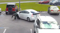 A Lee County, FL, sheriff's deputy was run down in the parking lot of the agency's headquarters Monday when a woman intentionally put her car in reverse and accelerated before driving off.