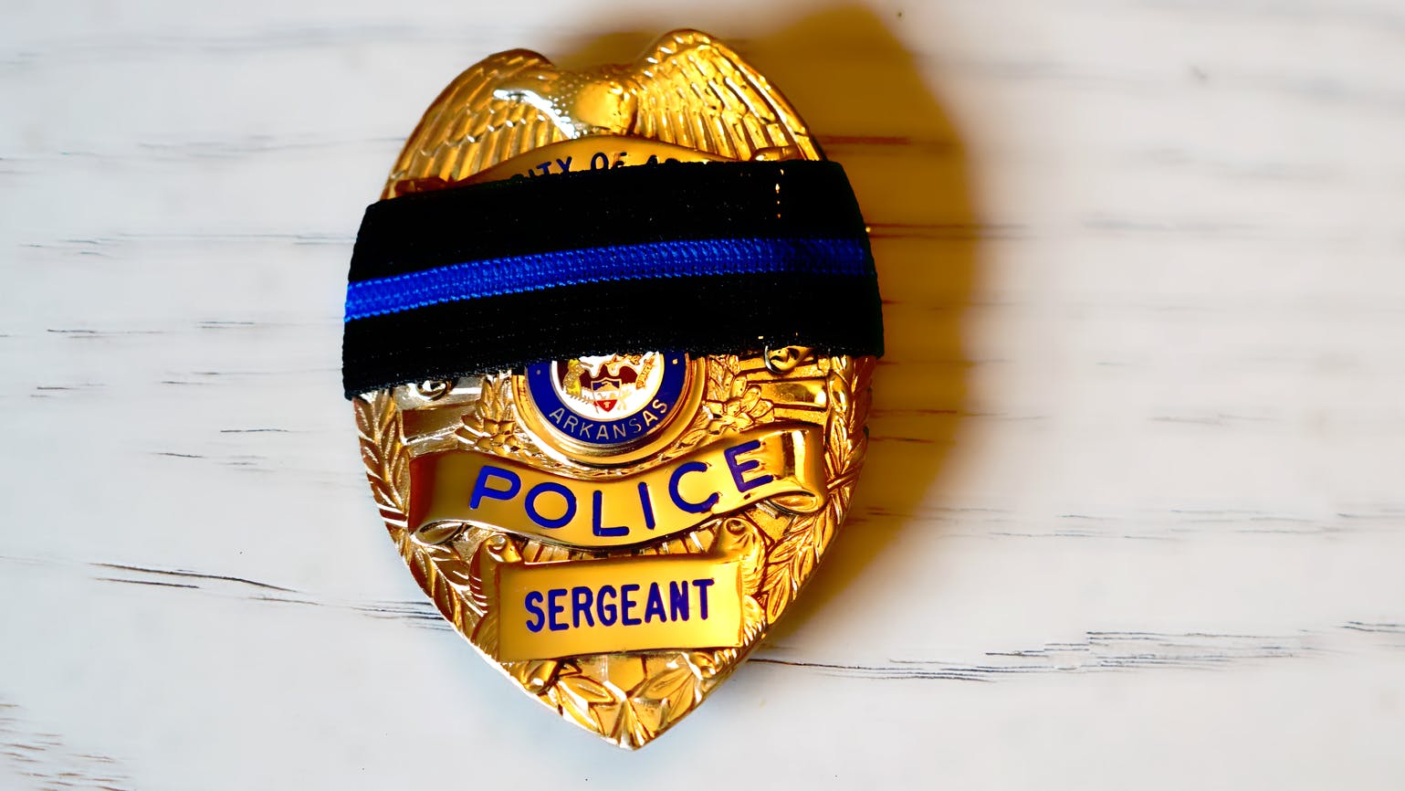 66faa8d7e3e9a126ae64a160 Police Badge Black Band Dt