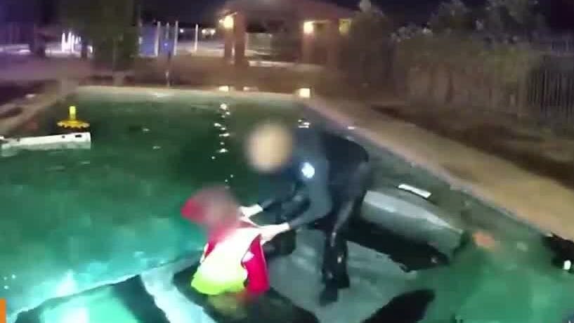 Phoenix police save man stuck in submerged car