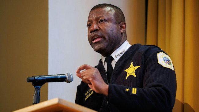 Chicago Police Superintendent Larry Snelling talks with attendees during a Community Commission for Public Safety and Accountability public meeting at the Irish American Heritage Center on Thursday.