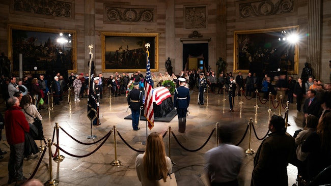 The public views the flag-draped casket of former President Jimmy Carter at the U.S. Capitol Rotunda in Washington, D.C. on Thursday.