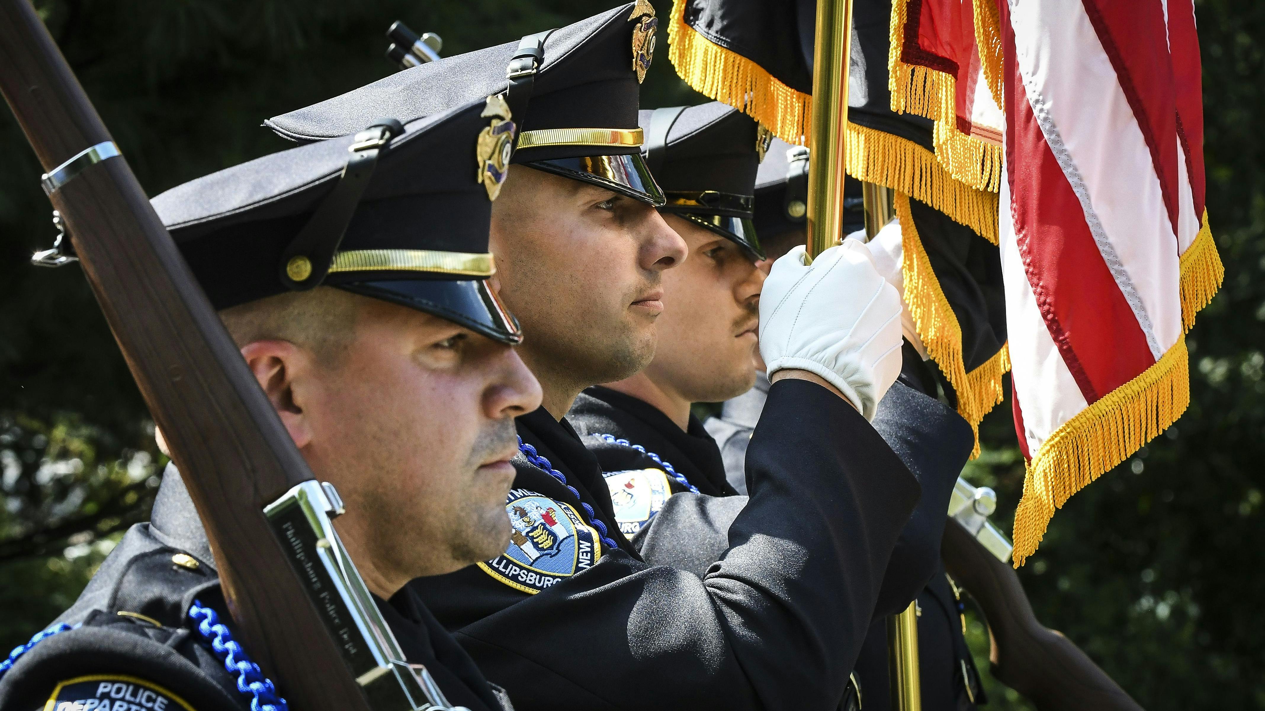 Members of the Phillipsburg, PA, Police Department Honor Guard present the colors at the Warren County Emergency Services and 9/11 Memorial in 2021.