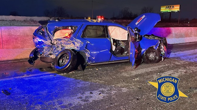 A Flint man is in the Saginaw County Jail after crashing into a Michigan State Police patrol vehicle on Interstate 75.