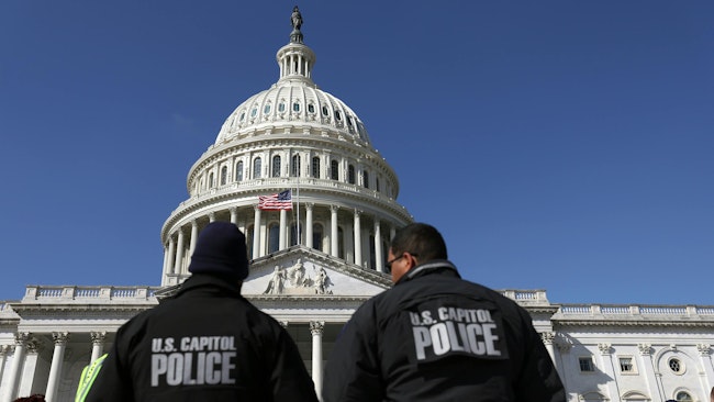 U.S. Capitol Police officers gather on the east front plaza of the Capitol in 2022.