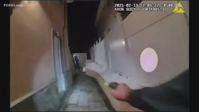 A Waterbury Police Detective Was Struck And Wounded In The Upper Leg In A Confrontation With A Suspected Carjacker Who Opened Fire With A Gun Equipped With A Laser Sight