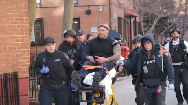 An Nypd Officer Was Struck In The Shoulder When Police Were Trying To Get A Gunman To Surrender After He Barricaded Himself In An Apartment Building When Authorities Executed A Search Warrant