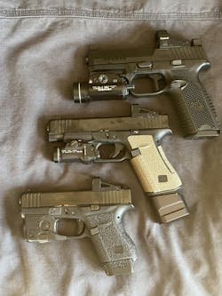 Top to bottom: FN 509MRD-LE, Glock 48, Glock 43. Handgun + light + optic = weapon system. Top to bottom: FN 509MRD-LE, Glock 48, Glock 43. Handgun + light + optic = weapon system.