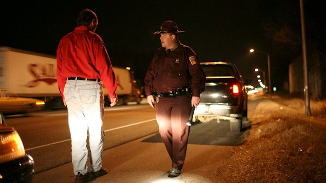 A Minnesota State Police trooper makes a DWI arrest.