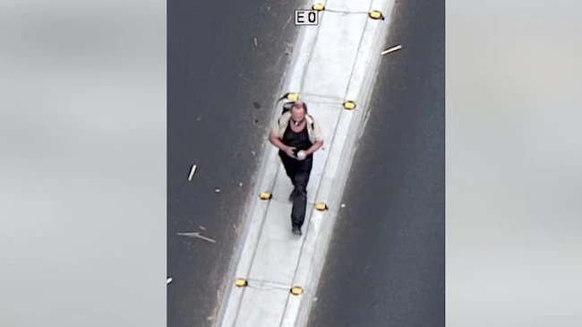 A man accused of spray-painting cars was apprehended by Las Vegas police Wednesday after he was spotted by the department's aviation unit, and officers were able to chase him down after he tried to flee on foot.