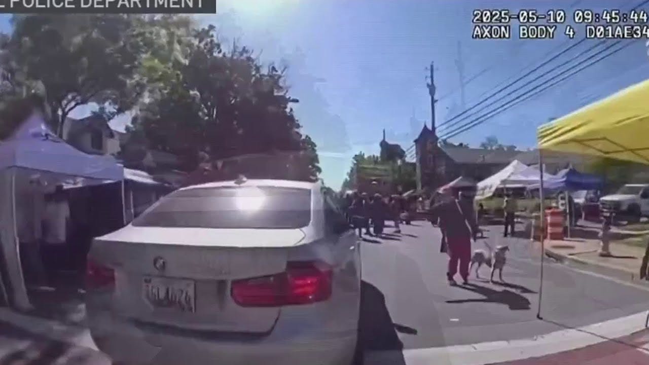 Body Camera Footage Captured A Laurel Police Officer As He Attempted To Stop A Woman Who Began Driving Through A Crowd Preparing For A Street Festival Because She Said She Had To Get To Work