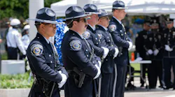 Honor guards stand during the memorial service Thursday for fallen officers at the National Law Enforcement Officers Memorial in Washington, D.C.