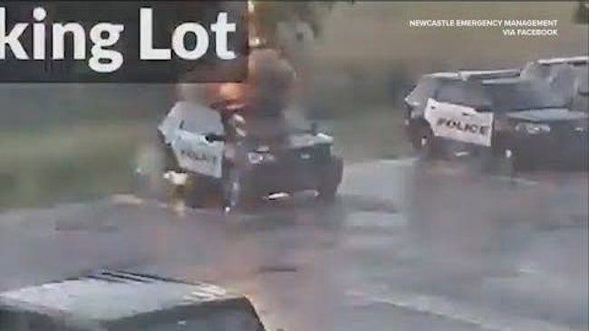 A Bright Flash And Then A Thick, Billowing Cloud Of Smoke That's What A Security Camera Captured When A Bolt Of Lightning Struck A Parked Unoccupied Newcastle Police Cruiser During A Storm