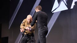 Espen Dahlen-Lervåg demonstrates some of his TASER training techniques during the opening session of Axon Week 2025 at the Phoenix Convention Center in April, Espen Dahlen-Lervåg demonstrates some of his TASER training techniques during the opening session of Axon Week 2025 at the Phoenix Convention Center in April,