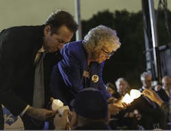 Troy Edgar, Deputy Secretary of the Department of Homeland Security, left, is seen with Connie Moyer, National President of Concerns of Police Survivors (COPS), during the 37th Annual Candlelight Vigil on May 13 in Washington, D.C. Troy Edgar, Deputy Secretary of the Department of Homeland Security, left, is seen with Connie Moyer, National President of Concerns of Police Survivors (COPS), during the 37th Annual Candlelight Vigil on May 13 in Washington, D.C.