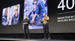Axon Founder and CEO Rick Smith, left, is seen with Norwegian police officer, trainer and researcher Espen Dahlen-Lervåg, who highlighted his work in combatives and close quarters TASER training during the opening session of Axon Week 2025 at the Phoenix Convention Center in April.