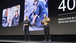 Axon Founder and CEO Rick Smith, left, is seen with Norwegian police officer, trainer and researcher Espen Dahlen-Lervåg, who highlighted his work in combatives and close quarters TASER training during the opening session of Axon Week 2025 at the Phoenix Convention Center in April. Axon Founder and CEO Rick Smith, left, is seen with Norwegian police officer, trainer and researcher Espen Dahlen-Lervåg, who highlighted his work in combatives and close quarters TASER training during the opening session of Axon Week 2025 at the Phoenix Convention Center in April.