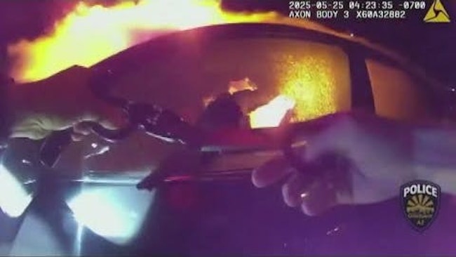 Goodyear Police Officer Dakota Berry Smashed A Window To Pull A Firefighter's Daughter Out Of A Burning Vehicle By Her Ankles Following A Mult Vehicle Crash