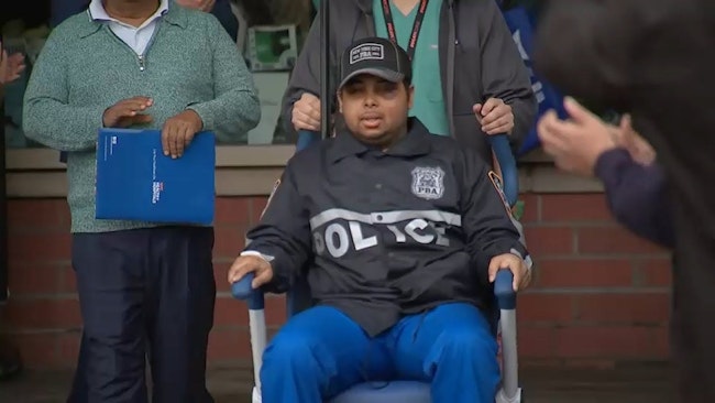 Nypd Officer Chowdhurry Nafees Was Greeted With Cheers From A Crowd Of Over 200 As He Was Released From The Hospital After He Was Critically Injured While Off Duty By A Pair Of Muggers In The Bronx
