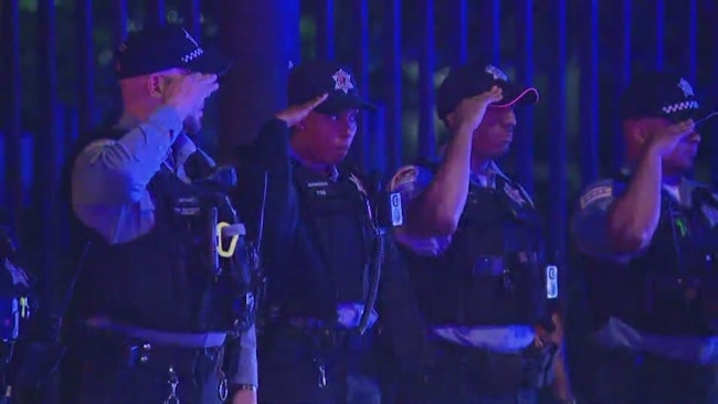 A Fatally Wounded Chicago Police Officer Was Rushed To The Hospital In A Cruiser, Which Crashed And Caught Fire From A Vehicle Malfunction, And Another Squad Card Was Needed To Finish The Trip