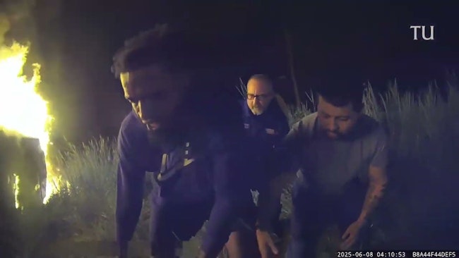 Body Camera Footage Captured A Chester Police Officer And A Bystander Smashed A Sunroof To Pull A 68 Year Old Woman Trapped Inside A Car That Burst Into Flames After A Rollover Crash