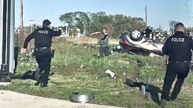 An Armed Man Wanted For Aggravated Battery Fleeing Chicago Police Crashed In An Indiana Intersection, Where He Opened Fire On Officers Before He Was Fatally Shot