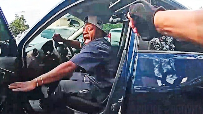 A Houston police sergeant wasn't seriously injured when he was caught between two vehicles near the Galleria Mall while trying to detain a driver in a car suspected in a 'jugging' incident and another vehicle when