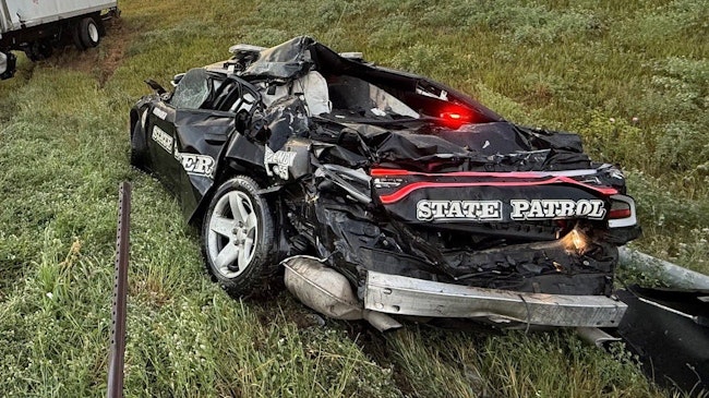 A Nebraska State Patrol trooper was injured Monday while helping with traffic control on Interstate 80 in Omaha when a box truck crashed into her cruiser.