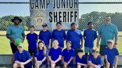 Calvert County SROs are seen with campers at the Calvert County Sheriff's Office's Camp Junior Sheriff. Calvert County SROs are seen with campers at the Calvert County Sheriff's Office's Camp Junior Sheriff.