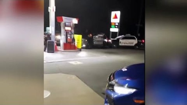 One New Britain Police Officer Was Pinned Between A Gas Station's Steel Beam And The Door Of A Stolen Car While Trying To Apprehend A Suspect Who Was Found Asleep At The Wheel At A Pump