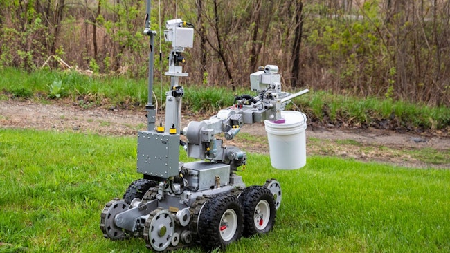 The Kalamazoo, MI, Department of Public Safety bomb squad uses a robot to remove explosives.