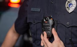 An officer is seen wearing a Motorola Solutions SVX Remote Speaker Microphone enabled with Assist. An officer is seen wearing a Motorola Solutions SVX Remote Speaker Microphone enabled with Assist.