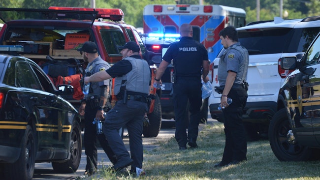 Scores of officers descended on Colorado Avenue in Lorain on Wednesday, as three officers were ambushed in an attack.