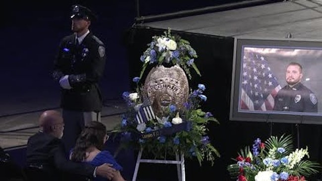 A Funeral Service For Fallen Lorain Police Officer Phillip Wagner At Cleveland's Rocket Arena Included Law Enforcement Officers From Around The State, As Well As The Two Officers Injured In The Attack That Killed Wagner