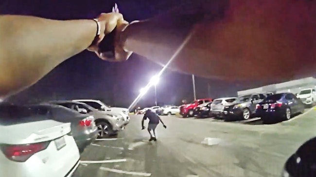 While Investigating A Shooting Outside A Nightclub, Uniformed Dallas Police Officers Working Off Duty Security In The Area Apprehended A Suspect, Who Continued Fleeing Even After He Was Shot In The Shoulder
