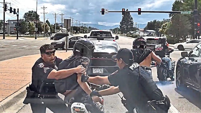 Pueblo Police Tackled A Motorcycle Rider At An Intersection After Officers Witnessed Him And Two Other Bikers Popping Wheelies And Performing Other Stunts On The Road