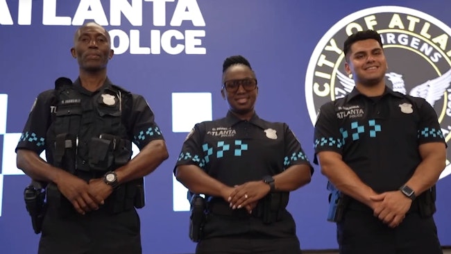 The Atlanta Police Department unveiled newly designed uniforms ahead of the eight matches the city will be hosting during next year's World Cup.