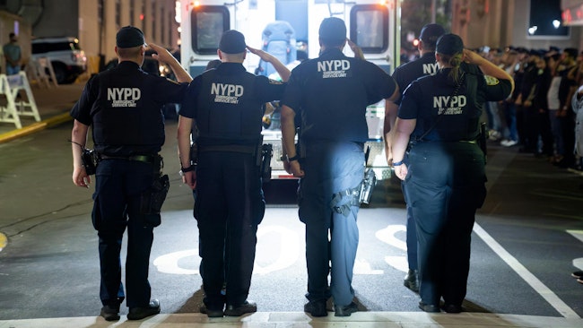 The body of NYPD Officer Didarul Islam is transferred from New York Presbyterian Hospital on July 28.