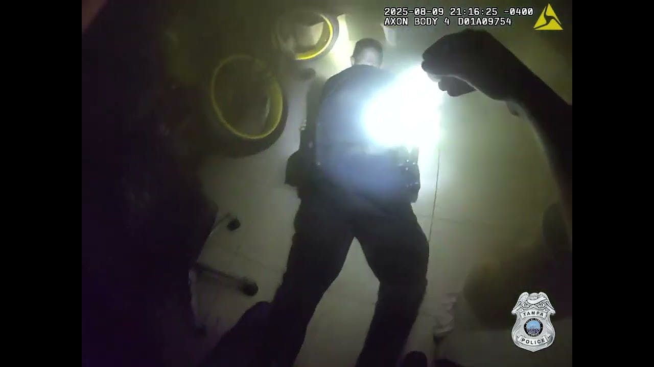 After Responding To A House Fire, Tampa Police Officers Rushed Into The Burning Residence And Carried Out A Man Who Was Still Inside