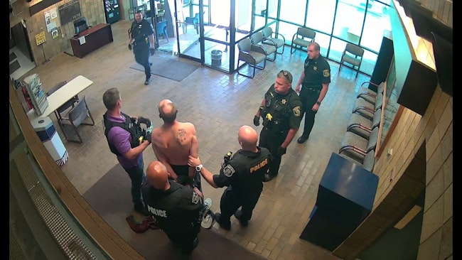 Security Camera Video Captured A 38 Year Old Man Breaking Through The Locked Lobby Of The Bay County Law Enforcement Center His Violence Continued Once Incarcerated, Assaulting A Fellow Inmate And Corrections Officer