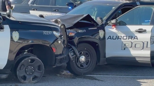 A 31-year-old suspect in a burglary call is accused of jumping into and speeding off in a parked Aurora police cruiser, leading officers on a 40-minute chase
