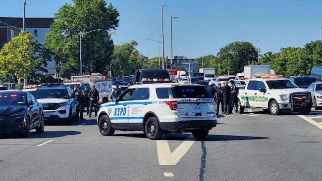 An NYPD officer was struck in the arm and leg during a shooting Friday in Queens' Astoria neighborhood.
