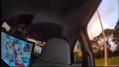 A Mario Kart video game played in the backseat as a Pinellas County, FL, sheriff's deputy rode along with a passing rideshare driver in a minivan in order to catch a suspect fleeing an Aug. 16 traffic stop on foot.