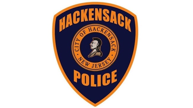 A 78-year-old man allegedly poured accelerant on a trio of unoccupied Hackensack police cruisers parked in an overflow lot before igniting a fire and fleeing the scene.