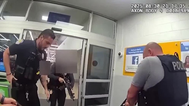 Recently released body camera footage captured Fort Pierce police officers subduing and arresting a man accused of waving a machete while walking through a Walmart before swinging the blade at officers.