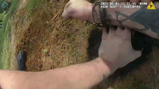 Wagoner County sheriff's deputies struggled with a man who allegedly struck a Tullahassee volunteer firefighter twice and backed into a fire truck as crews were trying to put out a burning home.