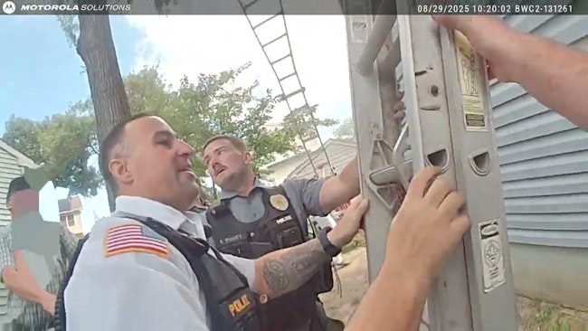Two Keansburg police officers who arrived at a house fire before firefighters told three children trapped on the home's second floor to jump into their arms.