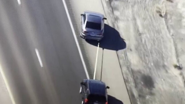 Las Vegas police pursued a man wanted on an attempted murder warrant who allegedly carjacked his ex-girlfriend's vehicle before using a Grappler to end the chase.