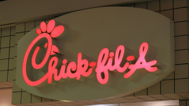 A 22-year-old driver is accused of striking a Newington police officer as he was trying to deploy stop sticks at a Chick-fil-A drive-thru in order to stop the suspect, who was in a vehicle connected to earlier police pursuits.